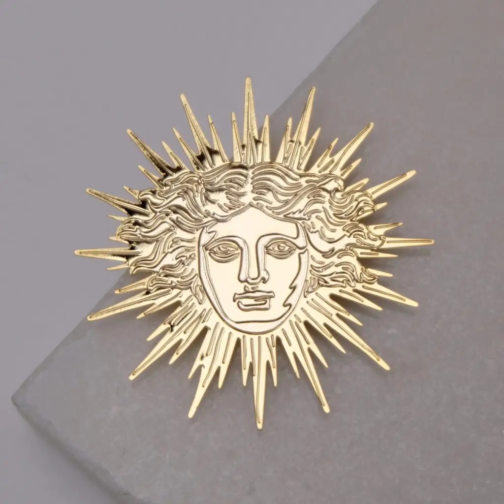 Magnet doré gravé et ajouré représentant l'emblème d'Apollon, créé pour le château de Versailles